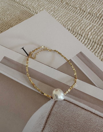 Armbånd i et elegant look med ferskvandsperle.